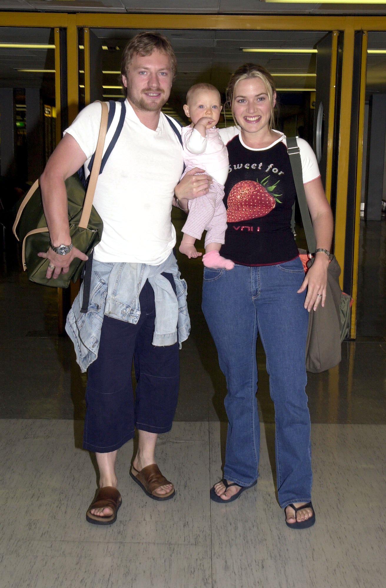 <p><span>Oscar-winning actress <a href="https://www.wonderwall.com/celebrity/profiles/overview/kate-winslet-330.article">Kate Winslet</a> and first husband Jim Threapleton, a director, were photographed with infant daughter Mia Threapleton at Heathrow Airport in London in June 2001. Keep reading to see Mia -- who's now an actress like her mom -- at 22...</span></p>