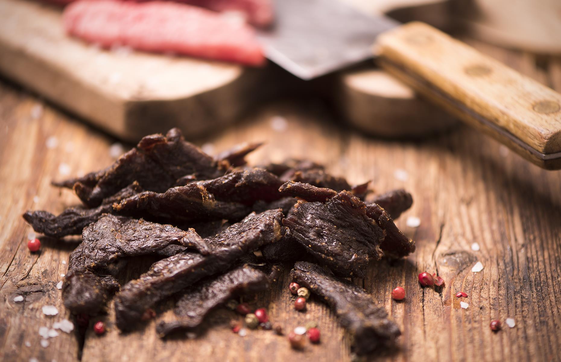 <p>Beef jerky may seem like a pretty modern snack, but its roots go back much further than you might think. A type of mummified beef jerky was <a href="https://cen.acs.org/articles/91/i47/Mummified-Beef-Jerky-Found-Pyramids.html">found in ancient Egyptian pyramids</a> in recent decades and, before that, its origins were pinned to the Incas. It's thought that the word "jerky" comes from the Quechuan (a language spoken in the Andes) word “ch’arki”, which means "dried meat".</p>