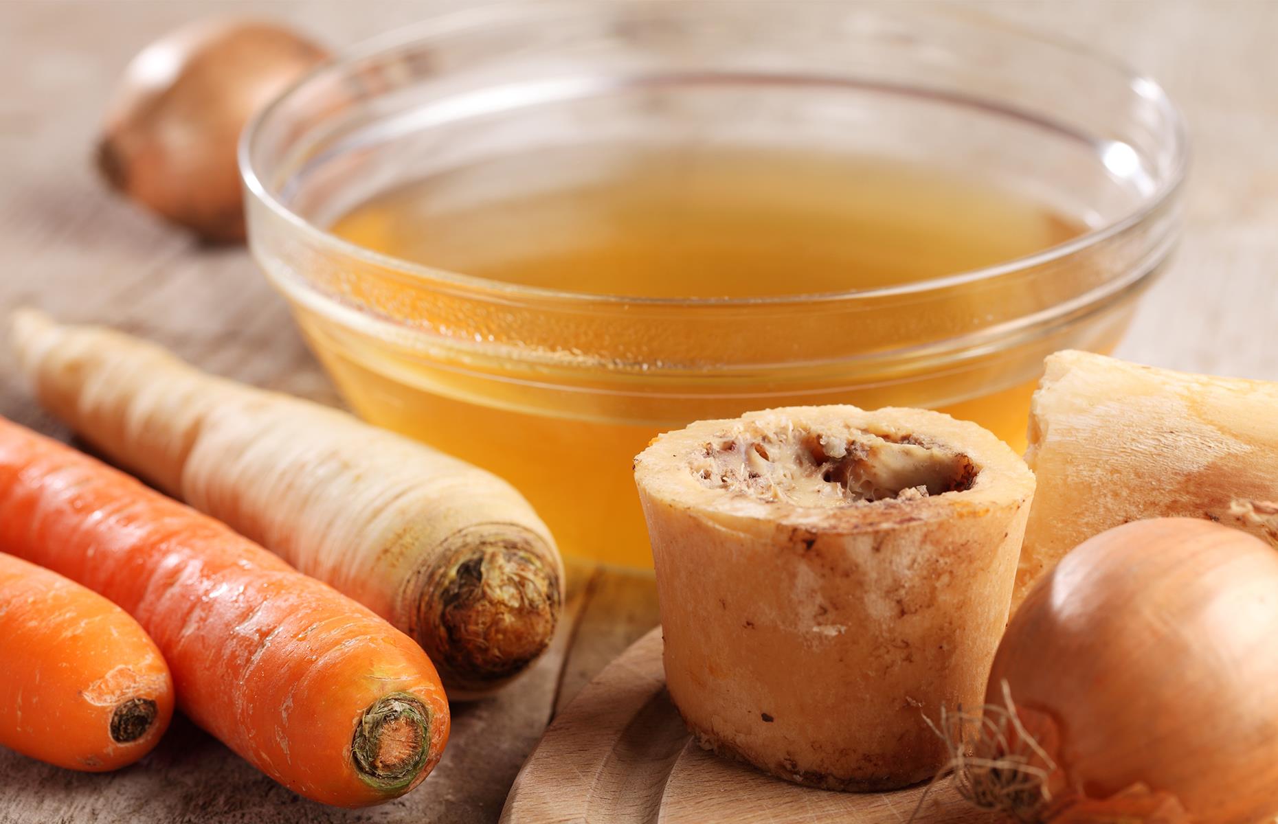 <p>Today, bone broth is revered by health food fanatics and paleo dieters, but it has a very long history indeed. The nutrient-packed broth is made by simmering leftover bones in water, often with vinegar and/or herbs and spices. Despite its modern popularity, it's thought to have originated with hunter-gatherer tribes in <a href="https://www.nytimes.com/2015/01/07/dining/bone-broth-evolves-from-prehistoric-food-to-paleo-drink.html">the late Stone Age</a>.</p>