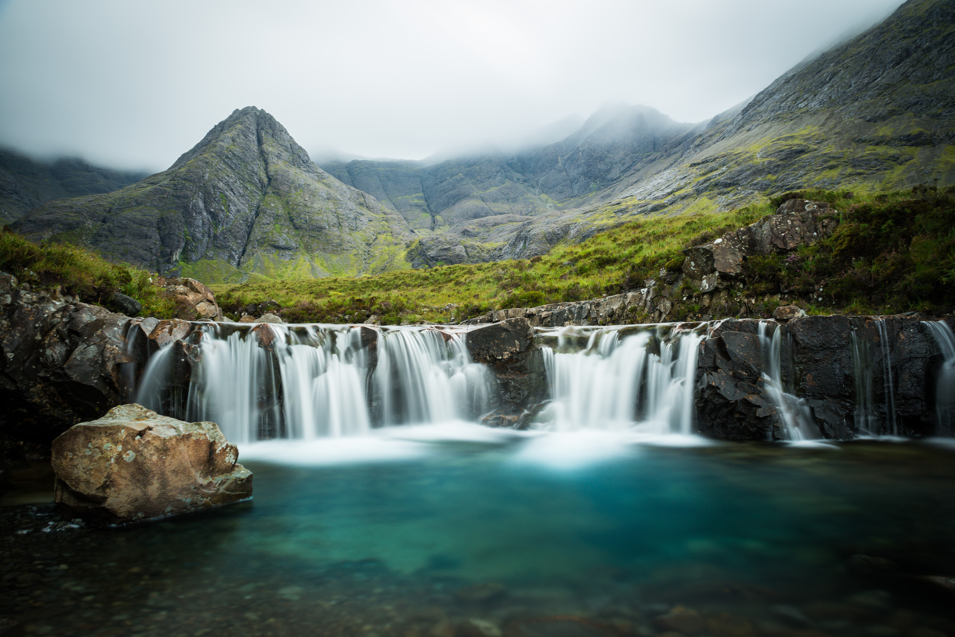 The Isle of Skye is full of legends and places said to have magical properties. The <a href="https://hiddenscotland.co/the-magical-waters-by-the-sligachan-bridge/" rel="noreferrer noopener">Sligachan River</a>, for instance, supposedly grants eternal beauty to those who rinse their faces in its bewitched waters. Near the village of Glenbrittle, <a href="https://www.atlasobscura.com/places/fairy-glen" rel="noreferrer noopener">Fairy Glen</a> lies in a lush valley where wishes are granted amid the enchanting, crystal-clear waters of the <a href="https://www.isleofskye.com/skye-guide/top-ten-skye-walks/fairy-pools" rel="noreferrer noopener">Fairy Pools</a>.