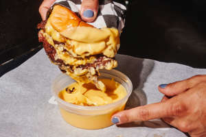 Smash burgers can be dipped in Cheez Whiz at Smashed on the Lower East Side.