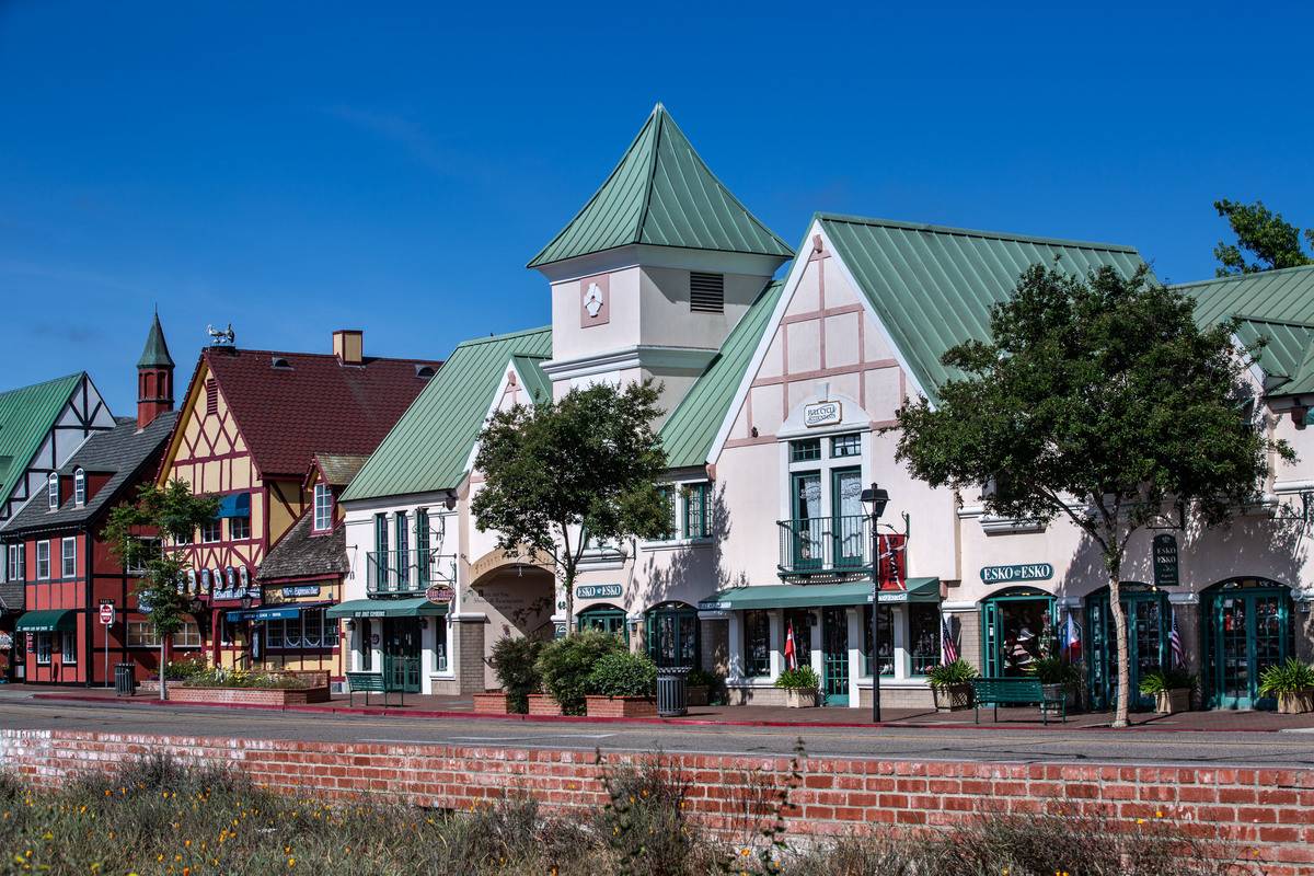 <p>Solvang, California is known as the Danish capital of America and the town has earned its title. The charming Denmark-inspired town is called Solvang after the Danish word for "sunny fields.</p> <p><a href="https://www.cityofsolvang.com/442/Solvang-History#:~:text=1804%20%2D%20Mission%20Santa%20Ines%20is,and%20farms%20began%2C%20crops%20planted." rel="noopener noreferrer">CityofSlovang.com</a> details the history of the town that was "founded by three Danish immigrants who purchased nearly 10,000 acres of prime land in the Santa Ynez Valley." In the 1930s, residents would begin building their homes in the Danish medieval style.</p>