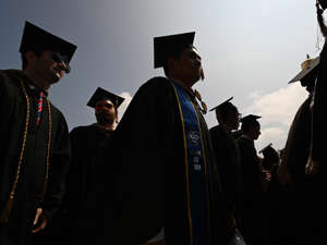 College graduates. Robyn Beck/AFP via Getty Images