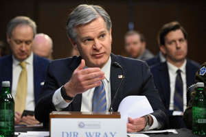 FBI Director Christopher Wray testifies during a Senate Intelligence Committee hearing on worldwide threats, in Washington, DC, on March 8, 2023.