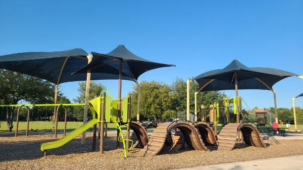If you have toddlers at home, you know that being outside offers so many benefits for them and yourself.   Looking for Shaded Parks near me was so important, especially when my kids were toddlers. However, the heat and harsh full sun can be a hindrance to outdoor fun, so looking for cool playgrounds with shaded areas is a must.