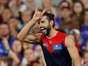 Brodie Grundy capped a successful debut for Melbourne with a goal in the final quarter