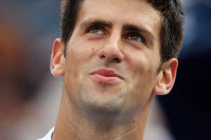 Novak Djokovic looks up and smiles after a long point while playing in the U.S. Open finals against Roger Federer in New York City on September 9, 2007. Photo by John Angelillo/UPI