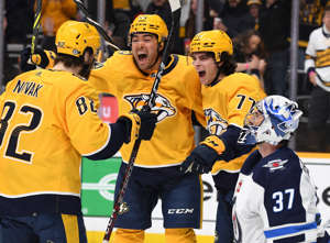 Tommy Novak, Kiefer Sherwood and Luke Evangelista (77), three of the Milwaukee Admirals' top 10 scorers, have been linemates with the NHL's Nashville Predators lately.