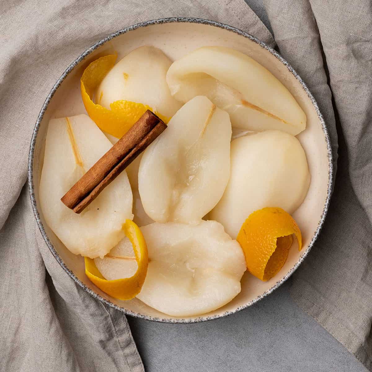 <p>Slowly simmered in a sweet syrup infused with cinnamon, cloves, and orange peel, these easy <strong><a href="https://www.spatuladesserts.com/poached-pears/">Poached Pears</a></strong> are the perfect elegant but simple dessert for your next gathering! </p> <p><strong>Go to the recipe:</strong> <strong><a href="https://www.spatuladesserts.com/poached-pears/">Poached Pears</a></strong></p>