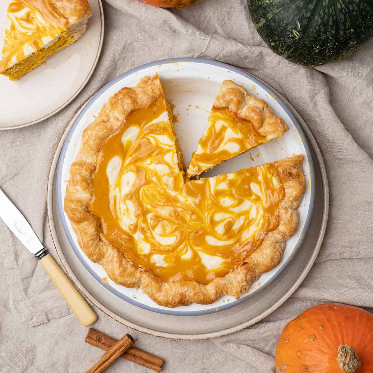 <p>This pie will be a unique addition to your next Fall or Thanksgiving gathering. The flaky pie crust provides a contrasting texture to the smooth and silky pumpkin filling. Not overly sweet, this pie offers a balance of savory flavors with a hint of sweetness from the cream cheese marbling. </p> <p><strong>Go to the recipe: <a href="https://www.spatuladesserts.com/pumpkin-cream-cheese-pie/">Pumpkin Cream Cheese Pie</a></strong></p>