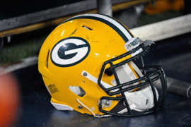 NASHVILLE, TN - AUGUST 09: A close up of a helmet of the Green Bay Packers on the sideline during a game against the Tennessee Titans at LP Field on August 9, 2014 in Nashville, Tennessee. (Photo by Frederick Breedon/Getty Images)