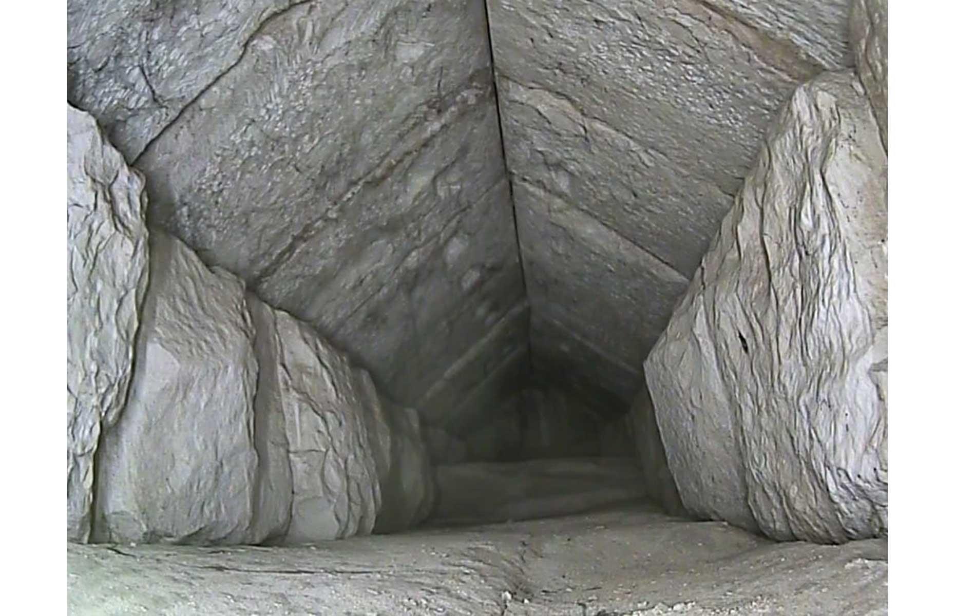 <p>The tunnel (pictured) measures 30 feet (9m) long and at least six feet (1.8m) wide, and is perched above the pyramid's main entrance on its northern side. This image was collected by feeding a minuscule endoscope (camera) through a tiny gap in the pyramid's masonry, and reveals an end chamber marked by two rough limestones. As for its purpose, all anyone can do at present is speculate, and theories range from a secret burial chamber to an architectural space designed to redistribute weight around the structure.</p>