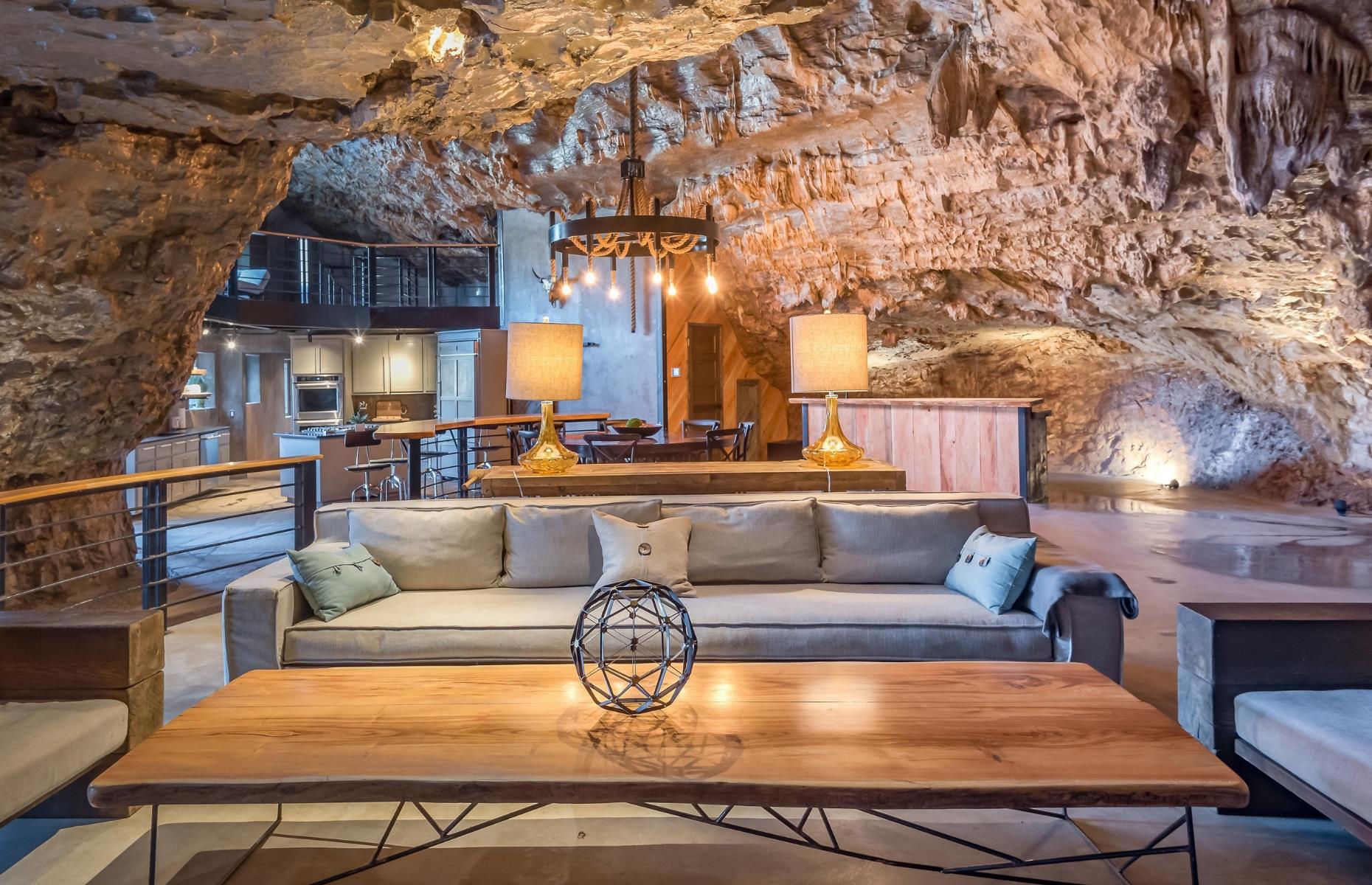 <p>The <a href="https://www.loveproperty.com/gallerylist/73942/surreal-estate-the-worlds-weirdest-properties">surreal property</a> sits inside a 260-acre cavern, high up on a ledge overlooking the valley of Beckham Creek in the Ozark Mountains. The perfect luxury hideaway for an apocalypse or invasion, the pad is entirely hidden from the outside and sits so high up that no zombie would know you were there.</p>