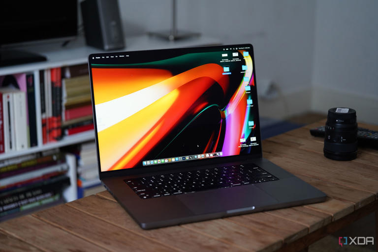 MacBook Pro M2 Max on a table showing desktop