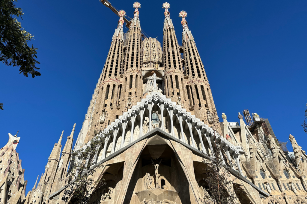 <p><em>By Krisitin of Global Travel Escapades</em></p> <p>Easily one of the most famous landmarks in the world is La Sagrada Familia. Located in the Eixample district of Barcelona, this awe-inspiring structure is the largest unfinished Catholic church in the world and has been under construction for over 140 years!<br> <br>The church originally began construction under the architect Francisco de Paula del Villar, but he quit. As such, renowned Catalan architect Antoni Gaudí took over as head architect and aimed to have the church reveal a combination of Gothic, Art Nouveau, and Modernista architecture.<br> <br>And even though, Gaudí passed away before much of the church was completed, he is recognized for his work and buried in the church’s crypt. Today, this structure has become a UNESCO World Heritage Site and stands as a symbol of Barcelona and the Catalan culture that extends to even the <a href="https://globaltravelescapades.com/day-trip-from-barcelona-to-andorra/" rel="noreferrer noopener">tiny country of Andorra</a>.<br> <br>Thus, if you ever find yourself in Barcelona, be sure to check out this architectural marvel.</p>