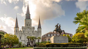 When you visit New Orleans in February, you can participate in Mardi Gras festivities or enjoy laid-back activities, like a stroll around Jackson Square.