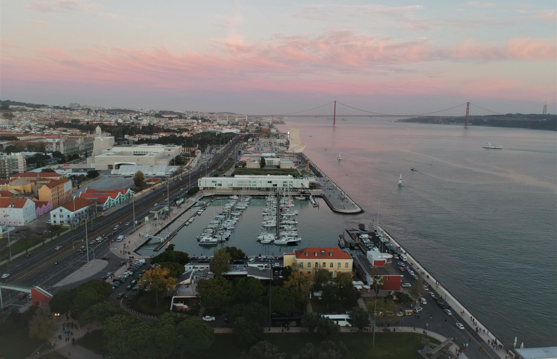 Captured at sunset in this stunning aerial shot, Lisbon’s historic port is a hub for both trade and tourism. Positioned at the mouth of the Tejo (Tagus) river and between the Mediterranean Sea and Northern Europe, the Port of Lisbon was a historically important seaport, especially during the 15th and 16th centuries when it was the centre of the Portuguese Empire.