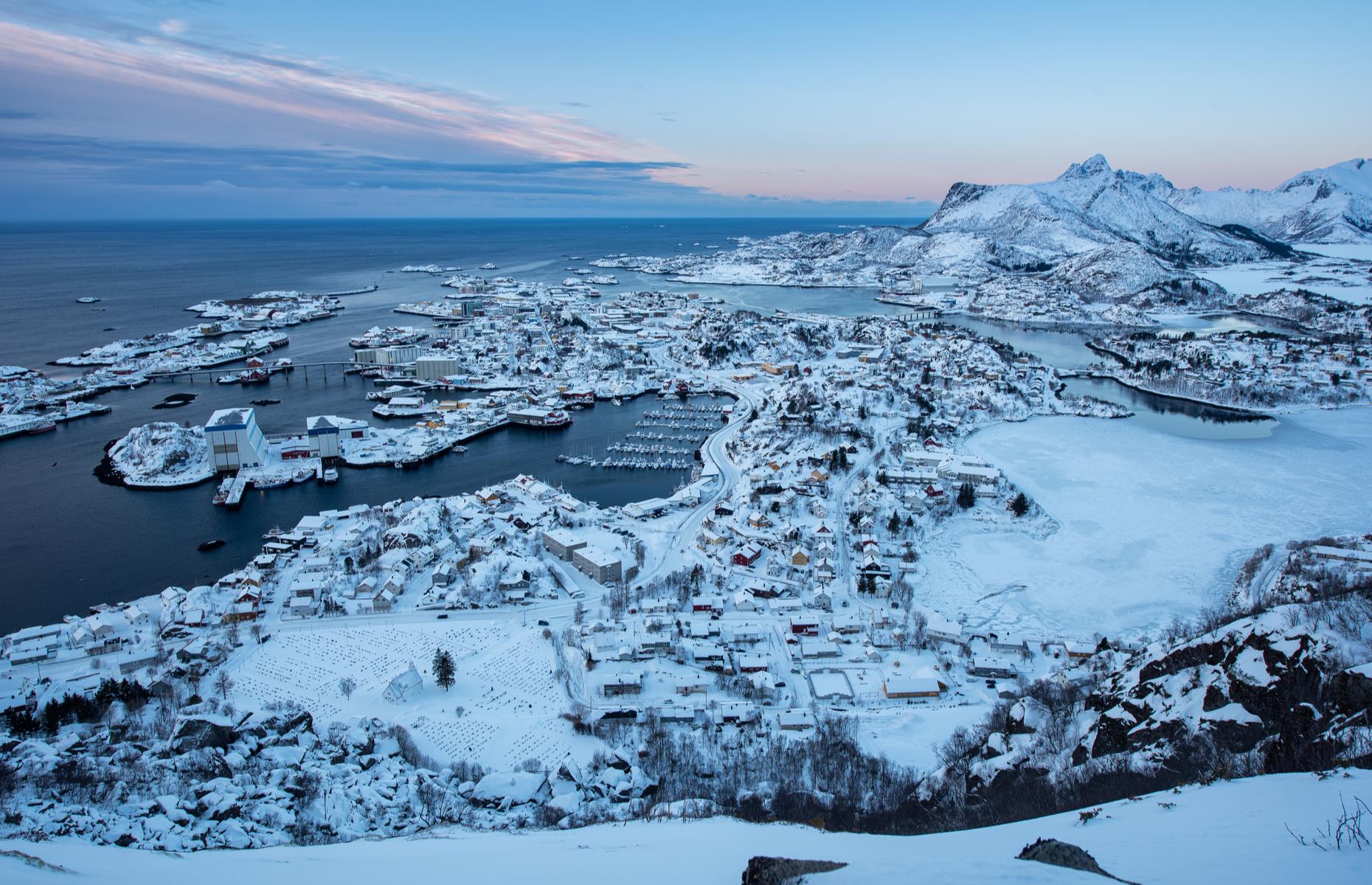 The tiny port town of Svolvær is located on the island of Austvågøya in the Lofoten archipelago, along the Vestfjorden. The isle offers plenty of dramatic landscapes, from mountains to lush green hills and white sandy beaches, making it a great destination for nature lovers. In this photo, the town is captured during winter with a blanket of snow.