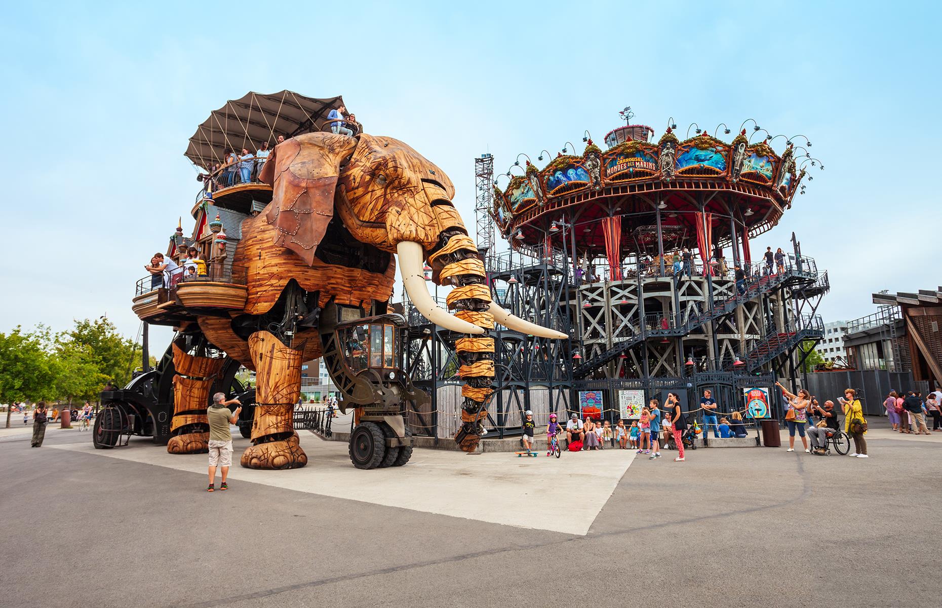 <p>It’s not every day you get to climb aboard a four-story high mechanical wooden elephant. But Nantes’ <a href="https://www.lesmachines-nantes.fr/en/discover/the-grand-elephant/">Les Machines de l’Île</a> allows you to do just that. As the elephant goes for its walk around an island on the banks of the River Loire, up to 50 people can hitch a ride on the viewing carriage on the elephant’s back and children love watching its levers work, moving the elephant's limbs and head as it 'walks'. Also at Les Machines De l'Île are carousels, a flight simulator and more ride-on machines.</p>