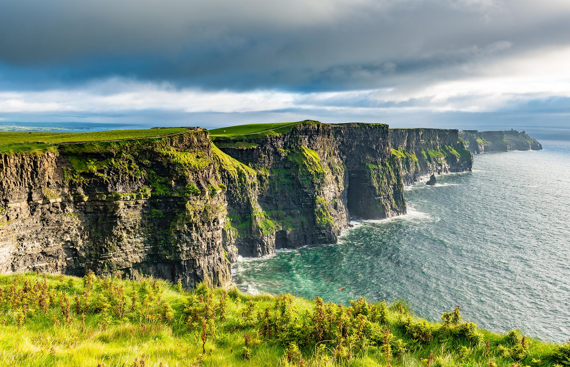 <p>Soaring 700 feet (214m) above the Atlantic Ocean and stretching some nine miles (14km) along Ireland’s rugged West County Clare Coast, there’s more than enough wow factor to mesmerise the whole family at the <a href="https://www.cliffsofmoher.ie/">Cliffs of Moher</a>. There are safe, paved pathways and telescopes with which to admire the views, seabirds and rare wildflowers, plus a multi-award-winning Visitor Centre (built into the hillside like a Hobbit’s cave) with exhibitions and interactive screens for children to learn about the animals and birds. Kids under 12 also go free. </p>