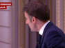 Emmanuel Macron removes his watch during interview