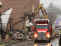 Cleanup and rescue crews are working through the debris of a Friday explosion at a chocolate factory in West Reading, Pennsylvania. Michael Rubinkam/The Associated Press