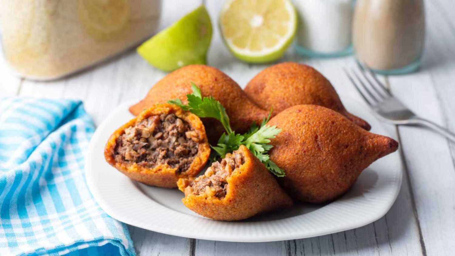 <p><span>If you want something authentic, you can't go wrong with Kibbeh, the national dish of Lebanon. These torpedo-shaped, fried croquettes are packed with bulgur, minced meat, onions, and sauteed <a href="https://www.corriecooks.com/pine-nut-substitute/" rel="noopener">pine nuts</a>. </span></p> <p><span>If you're in the mood for something light, look no further than Tabbouleh. A salad made of mint, parsley, fresh tomatoes, olives, onions, and bulgur or couscous, this colorful staple is excellent as a side or a main dish. </span></p> <p><span>A crunchy, creamy dessert known as Kunāfah makes a beautiful finish for a traditional Lebanese meal, especially if you like the flavor of citrus. </span></p>