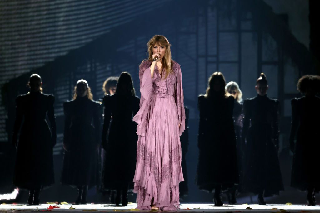 <p>In another romantic moment, Swift donned a rich purple dress<a href="https://www.instagram.com/p/Cp7ycfEon5a/?hl=en"> Alberta Ferretti dress</a>.</p>