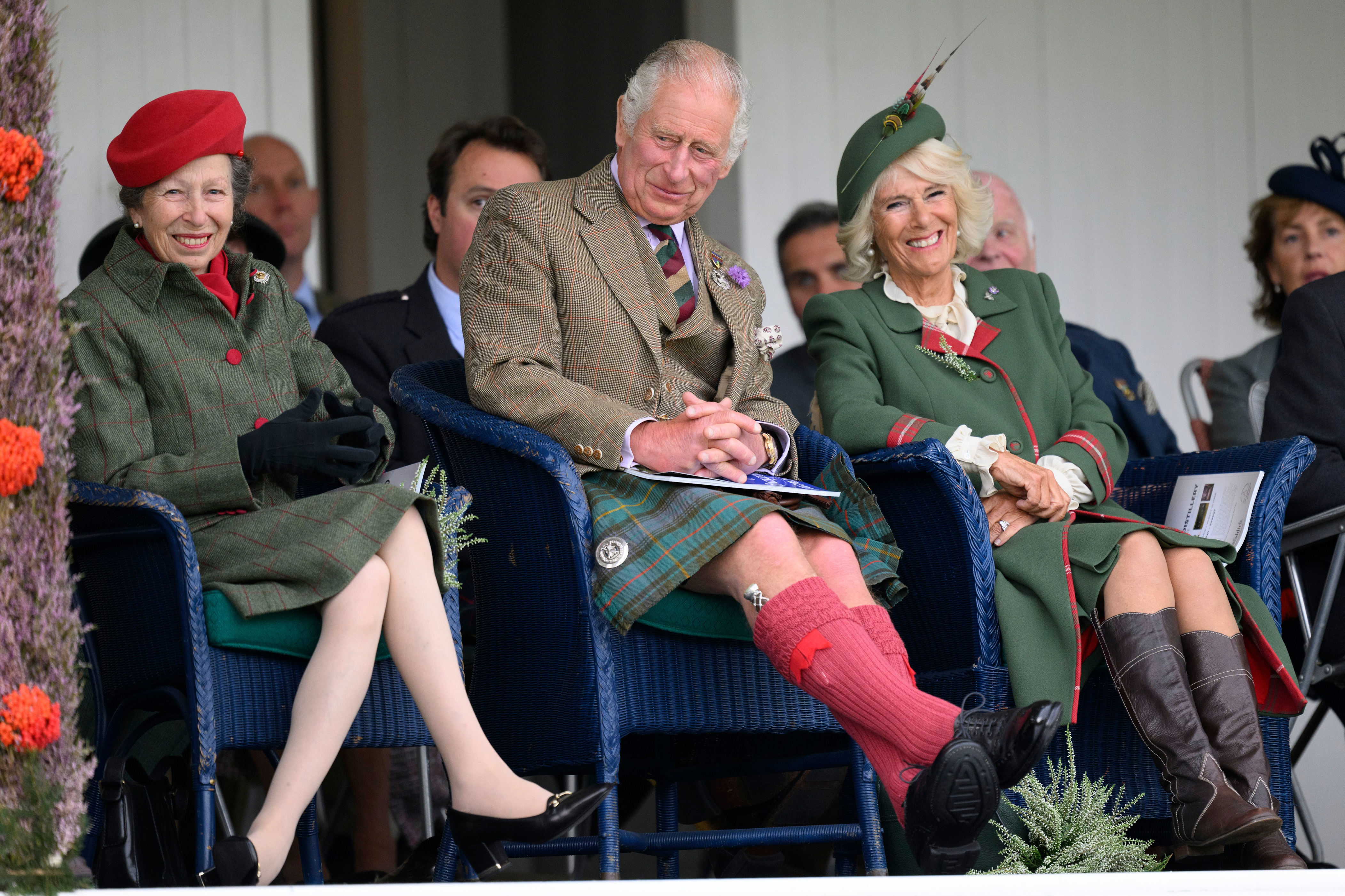 <p><span>With Queen Elizabeth II unable to attend due to ongoing health issues, her two oldest children -- Princess Anne and Prince Charles -- went in her stead and shared a laugh with the then-Prince of Wales's wife, Camilla, Duchess of Cornwall, during the annual Braemar Gathering Highland Games at the Princess Royal and Duke of Fife Memorial Park in Braemar, Aberdeenshire, Scotland, on Sept. 3, 2022 -- five days before </span><a href="https://www.wonderwall.com/celebrity/celebrities-dignitaries-react-to-death-of-queen-elizabeth-ii-647756.gallery">the queen's death</a><span> at Balmoral Castle, her estate in the Scottish Highlands, and her son's accession as the newly named King Charles III.</span></p>