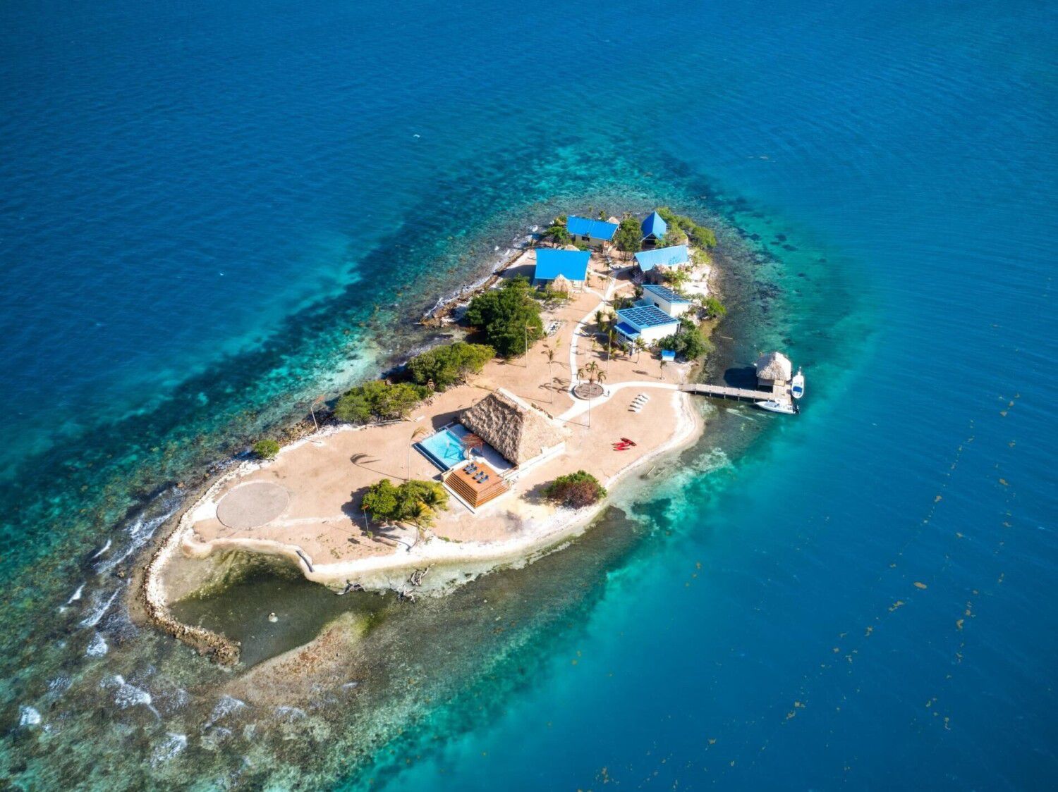 <p>Gaze upon a paradise of extraordinary beauty at this all-inclusive private island 15 minutes off the coast of Placencia, Belize. Surrounded by the crystal clear Caribbean Sea and its own live coral reef, this rare 2.2-acre coral island boasts white sandy beaches and gentle waves lapping against its shores.</p><p>Enjoy five 1,000-plus-square-foot villas and luxury treatment like chef-prepared meals, concierge services and on-site massages. The heart of Kanu is the massive thatch-roofed central palapa with a large swimming pool, communal kitchen, bar, and living area.</p><p><a href="https://www.vrbo.com/1510149?adultsCount=5&arrival=2023-04-14&departure=2023-04-16">This certified Gold Standard Property</a> starts at $5,560 a night for up to 20 people.</p>