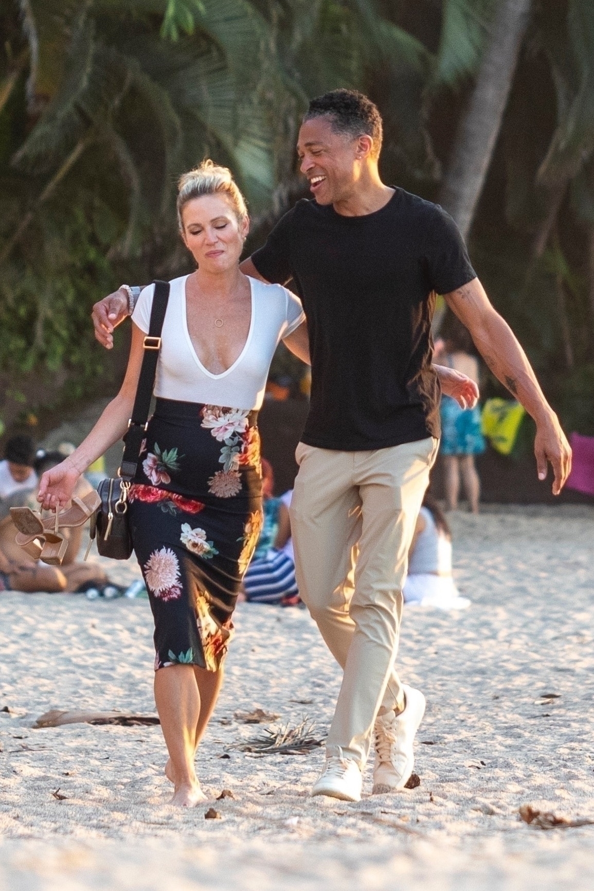 <p>Former "Good Morning America" stars Amy Robach and T.J. Holmes strolled on the sand during a beach vacation in Puerto Vallarta, Mexico, on Feb. 25. </p>