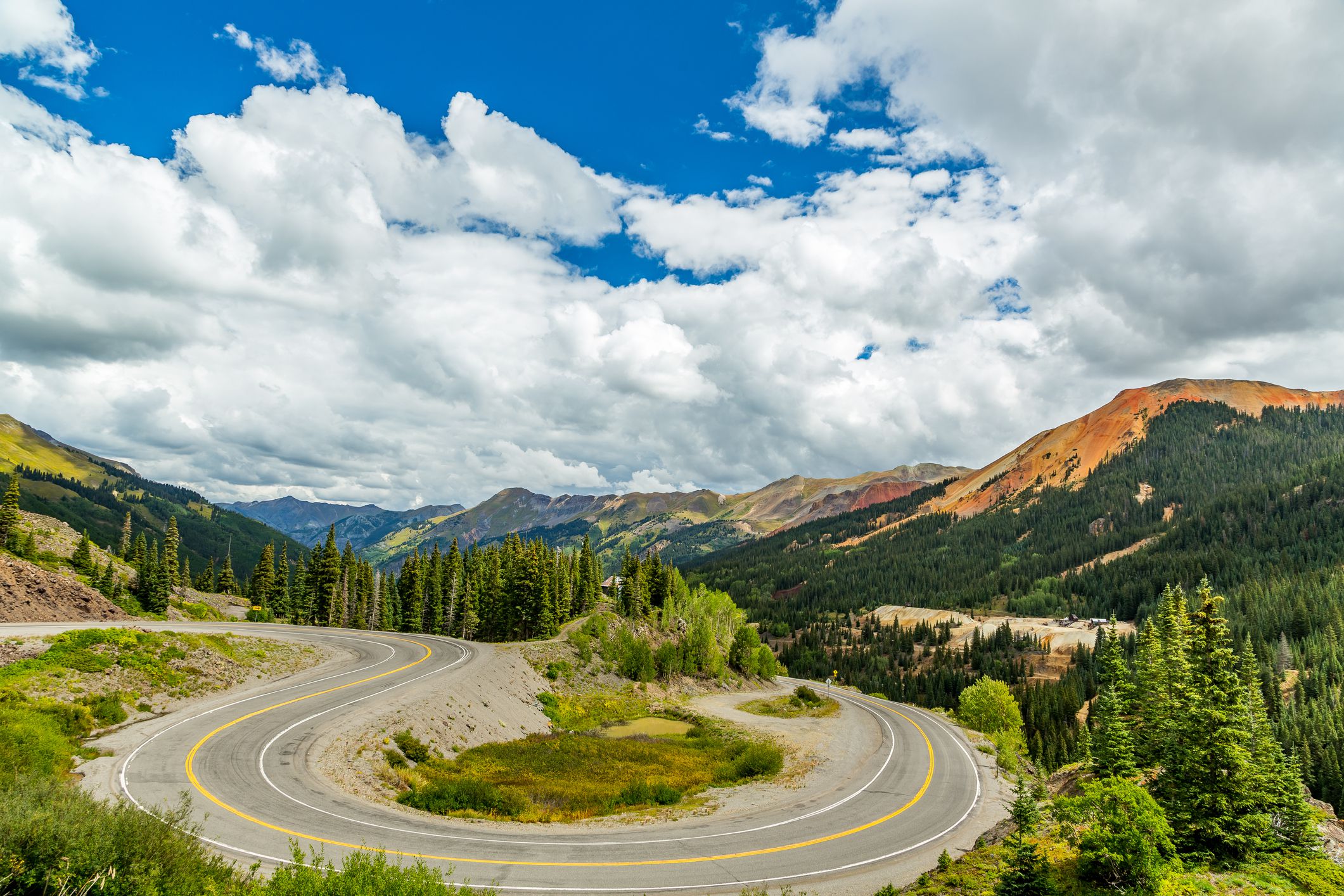 <b>Colorado </b>The 236 miles of the <a href="https://www.colorado.com/articles/colorado-scenic-byway-san-juan-skyway">San Juan Mountain Skyway</a> offer some of Colorado's most dramatic Rocky Mountain vistas: rugged peaks, lush forests, rushing rivers, and the occasional abandoned mine. But beware: This route includes a hair-raising stretch that Jerry Raymond, founder of <a href="https://hogtours.com/">Hog Tours</a>, says will test even the most experienced rider with guardrail-free twists and turns at dizzying heights. "If you're looking for challenging twisty roads, then Colorado is the area. The short ride from Durango through Silverton and on to Ouray includes the famous <a href="https://blog.cheapism.com/scariest-roads-in-the-world/">Million Dollar Highway</a>. A lot of the road follows the old mining railroad and twists and turns through the mountains." Fortunately, there are plenty of turnouts where you can safely enjoy the views, and historic towns that offer a chance to slow down and see some sights after an afternoon of riding.  <p><b>Can't-miss stop: </b>There are many diversions along this route, but consider hopping aboard the <a href="https://www.durangotrain.com/">Durango and Silverton Narrow Gauge Railroad's</a> steam-powered locomotive for a completely different way to explore the area. </p>