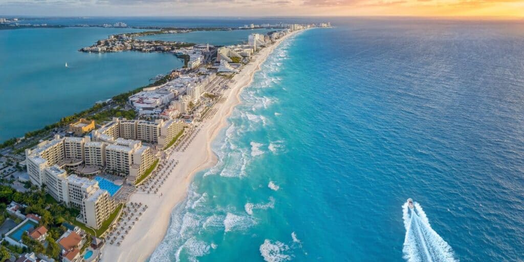 <p>Cancun remains one of the top destinations for summer travel this year despite the ongoing violence in the country. <a href="https://travel.state.gov/content/travel/en/traveladvisories/traveladvisories/mexico-travel-advisory.html" rel="noopener">Travel advisories</a> for the Cancun and <a href="https://wanderwithalex.com/riviera-maya-mexico/">Riviera Maya</a> regions state, <em>“to exercise increased situational awareness after dark in downtown areas of Cancun, Tulum, and Playa del Carmen and to remain in well-lit pedestrian streets and tourist zones.”</em></p> <p>Cancun is a beautiful vacation destination known for its beaches, turquoise waters, and vibrant nightlife. The city offers a variety of activities, including snorkeling, scuba diving, parasailing, jungle tours, and zip-lining. The Hotel Zone, a long strip of resorts, hotels, restaurants, and shops, is a popular area for tourists to explore. The ancient ruins of Chichen Itza and Tulum are also within easy reach of Cancun and provide a glimpse into the region’s rich history and culture.</p> <p>This article <a href="https://wanderwithalex.com/top-summer-vacation-destinations/">Expedia Reveals the Top Summer Vacation Destinations for 2023</a> originally appeared on <a href="https://wanderwithalex.com">Wander With Alex</a>. Study by <a href="https://www.multivu.com/players/English/9084352-expedia-summer-travel-forecast/" rel="noreferrer noopener nofollow">Expedia</a>.</p> <h2 class="simplefeed_msnslideshows_more_article">More Articles From Wander With Alex</h2> <ul>   <li><a href="https://wanderwithalex.com/tropical-islands-vacation/">15 Beautiful Tropical Islands for Your Next Vacation</a></li>   <li><a href="https://wanderwithalex.com/things-to-do-in-aruba/">Travel Tips and Things to Do in Aruba on Your Caribbean Vacation</a></li>   <li><a href="https://wanderwithalex.com/caribbean-islands/">27 Sun-Drenched Caribbean Islands for Vacation</a></li>  </ul>