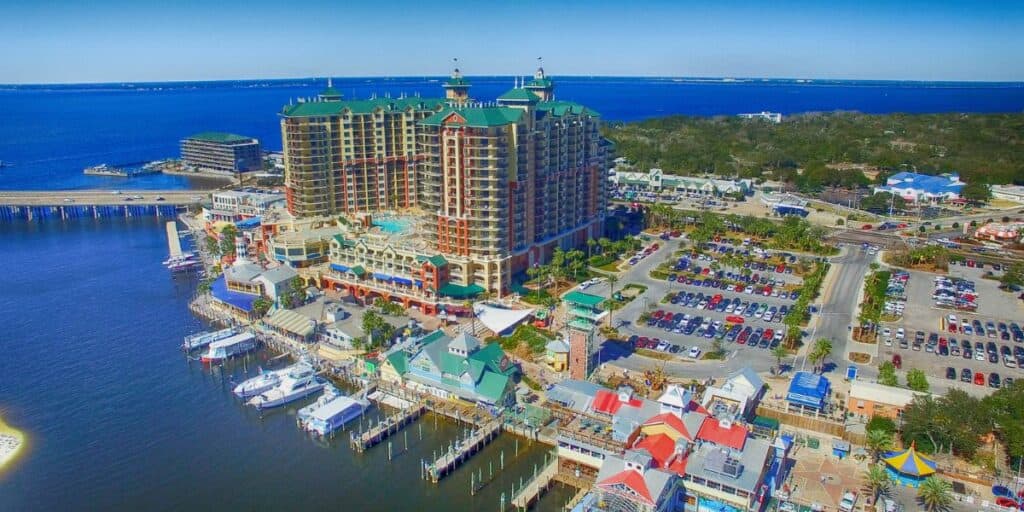 <p><em>Recommended by Caitlin of <a href="https://twinfamilytravels.com/" rel="noopener">Twin Family Travels</a></em></p> <p><a href="https://wanderwithalex.com/things-to-do-destin-florida/">Destin-Fort Walton Beach, Florida</a>, has no shortage of options to get outside and in the water. With its beautiful white sand beaches and emerald green waters, the area continues to be one of the best beaches in the South. </p> <p>Henderson Beach State Park is a gem. Explore the outdoors on a nature trail and soak up the sun on this beautiful beach. There are numerous other beach access points and beach parks to enjoy. </p> <p>The pirate or <a href="https://tp.media/r?marker=330339&trs=144489&p=1922&u=https%3A%2F%2Fwww.viator.com%2Ftours%2FDestin%2FDolphin-Cruise-into-Gulf-of-Mexico%2Fd25549-32745P1" rel="noreferrer noopener nofollow sponsored">dolphin cruises</a> are great for the whole family. Fishing charters are very popular. Rent a boat or take a water taxi to the popular sandbar, <a href="https://tp.media/r?marker=330339&trs=144489&p=1922&u=https%3A%2F%2Fwww.viator.com%2Ftours%2FDestin%2FCrab-Island-Adventure-3HR%2Fd25549-117922P1" rel="noreferrer noopener nofollow sponsored">Crab Island</a>. Snorkeling, paddleboarding, kayaking, jet skiing, and parasailing are other available water activities. </p> <p>Destin also has an abundance of shopping and dining options. Destin Commons has over 95 stores and restaurants. HarborWalk Village is another popular spot, especially for dining with an ocean view. Destin-Fort Walton Beach is a great place for a <a href="https://wanderwithalex.com/destin-fort-walton-beach-fl-family-vacation/">family vacation</a>. </p>