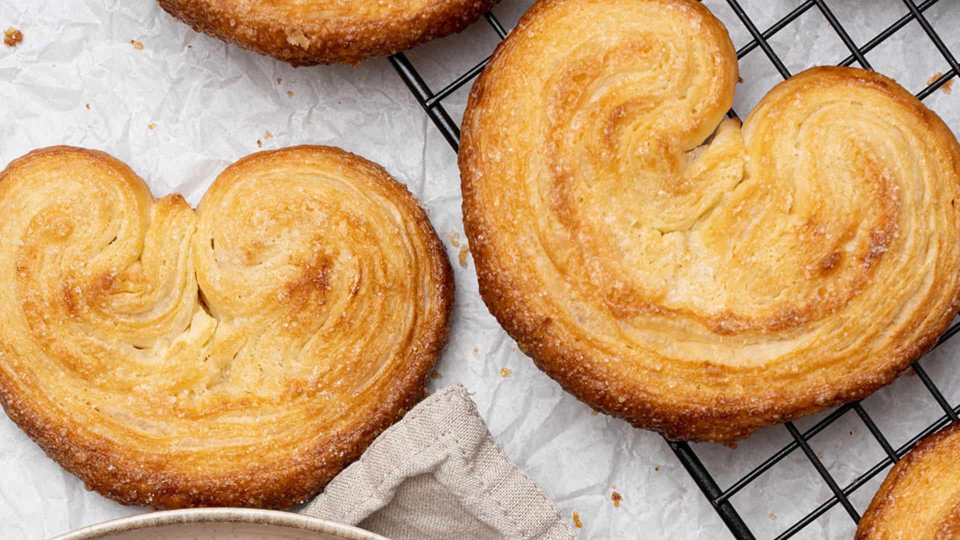 <p>These deliciously sweet and buttery Palmiers cookies are perfectly light, crispy, and crunchy perfection with each bite! Made with just a package of store-bought puff pastry and a bit of sugar, this 2-ingredient easy recipe comes together in just 40 minutes! Your family is sure to be impressed when you present them with these famous...</p>