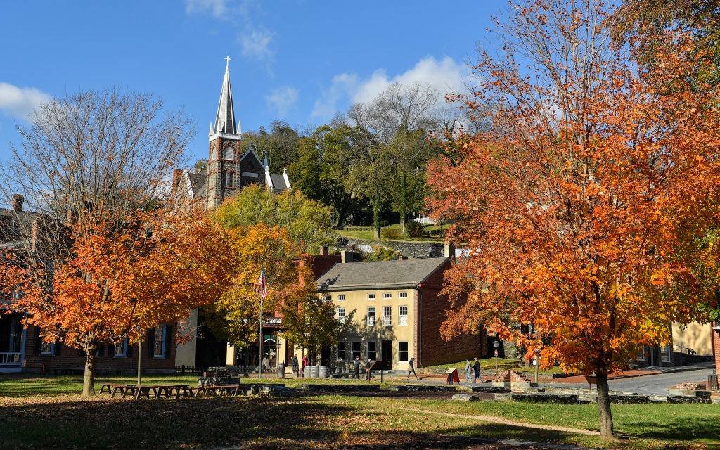 <p>Summer visitors come to Harpers Ferry, West Virginia for the water activities. The town is between the Potomac and Shenandoah rivers, so visitors can go whitewater rafting, canoeing, tubing, kayaking, and more.</p> <p>Hikers will be thrilled that the Appalachian Trail runs through the city where they can cross beautiful ravines through the woods. Harpers Ferry also has a Civil War Museum and a site called John Brown's Fort, which was part of the 1859 abolitionist raid.</p>