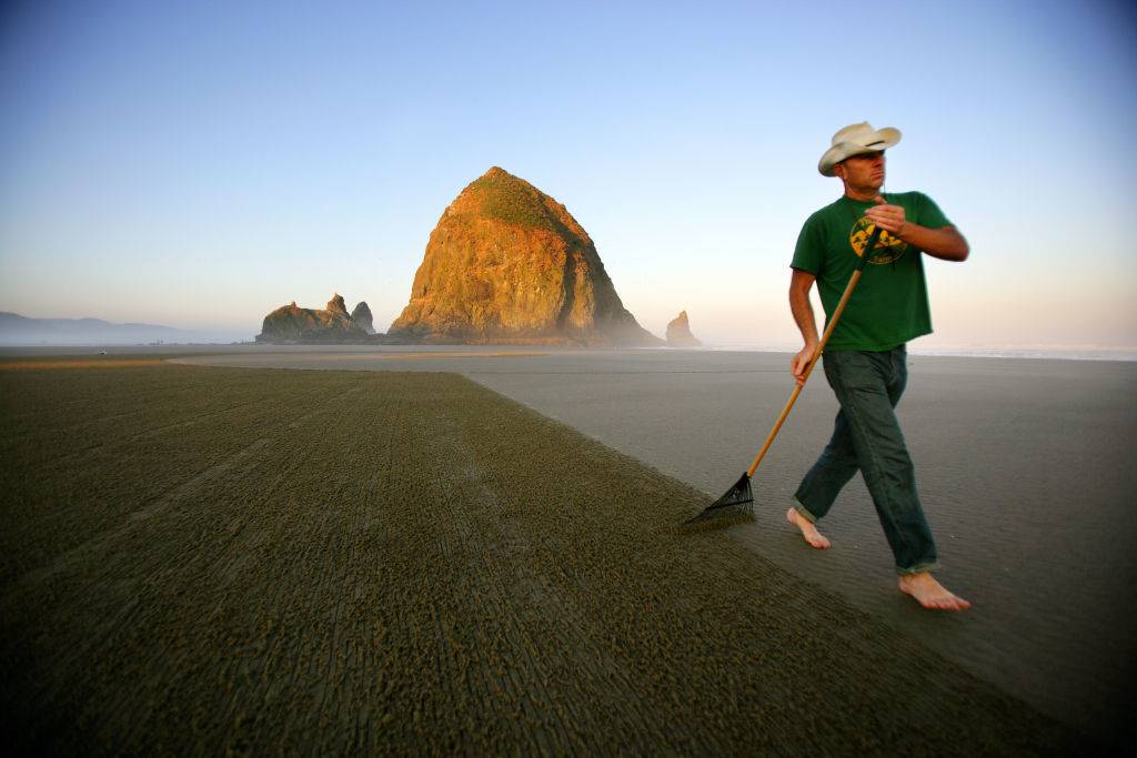 <p>Anyone who comes to Cannon Beach, Oregon will notice how vast the actual beach is. It stretches a total of four-miles long and has several towering rock formations along the way.</p> <p><i>National Geographic</i> called Cannon Beach "One of the World's 100 Most Beautiful Places." One of the best viewpoints of the landscape is Ecola State Park, which also makes for a fun recreation area. The town is quintessentially picturesque with long sidewalks, pretty courtyards, public art, specialty shops, restaurants, and art galleries.</p>