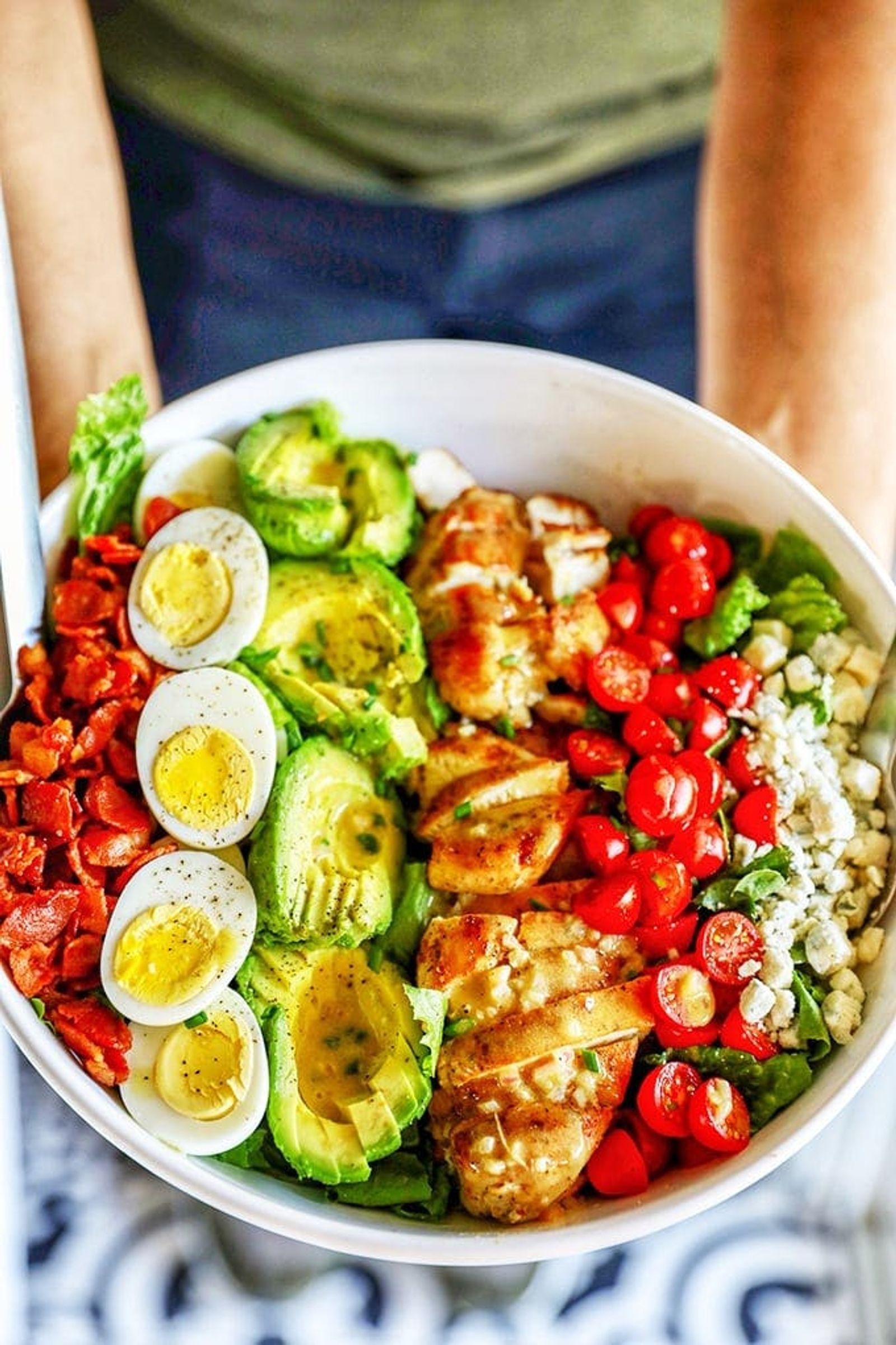 Use leftover chicken, pre-crumbled bacon, hard-boiled eggs, and your favorite dressing to quickly assemble a hearty lunch that<em> hardly </em>feels like a salad. (via <strong><a href="https://www.number-2-pencil.com/chicken-cobb-salad-recipe/">No. 2 Pencil</a></strong>)