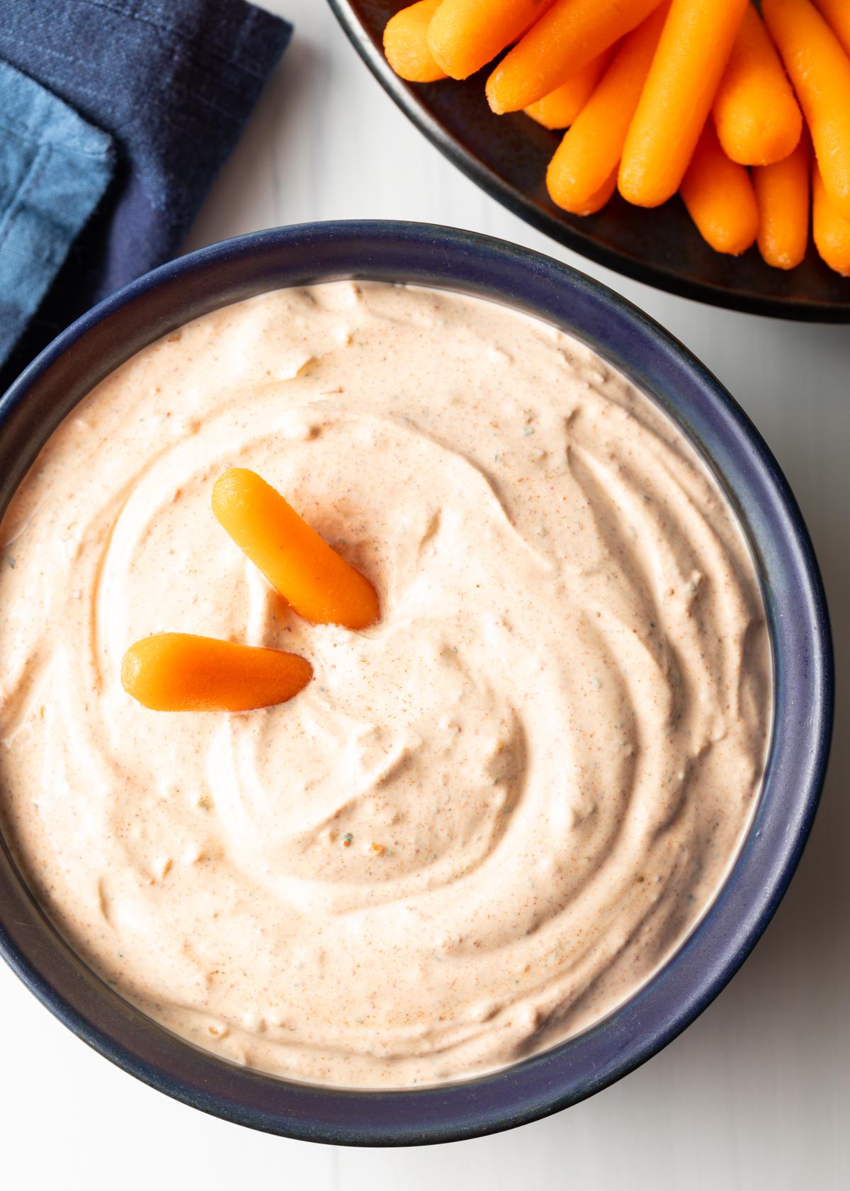We're throwing it back to elementary school days with a dip that's perfect for carrots, celery, and all other kinds of finger foods. (via <strong><a href="https://www.aspicyperspective.com/3-ingredient-magic-taco-dip-recipe/">A Spicy Perspective</a></strong>)