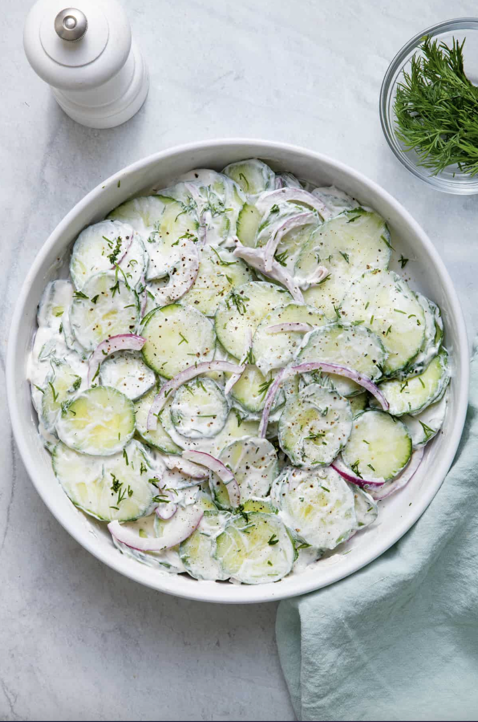 This flavorful 5-minute salad made with sour cream, red onion, and dill is delicious on its own or on top of toast. (via <a href="https://feelgoodfoodie.net/recipe/creamy-cucumber-salad/"><strong>Feel Good Foodie</strong></a>)
