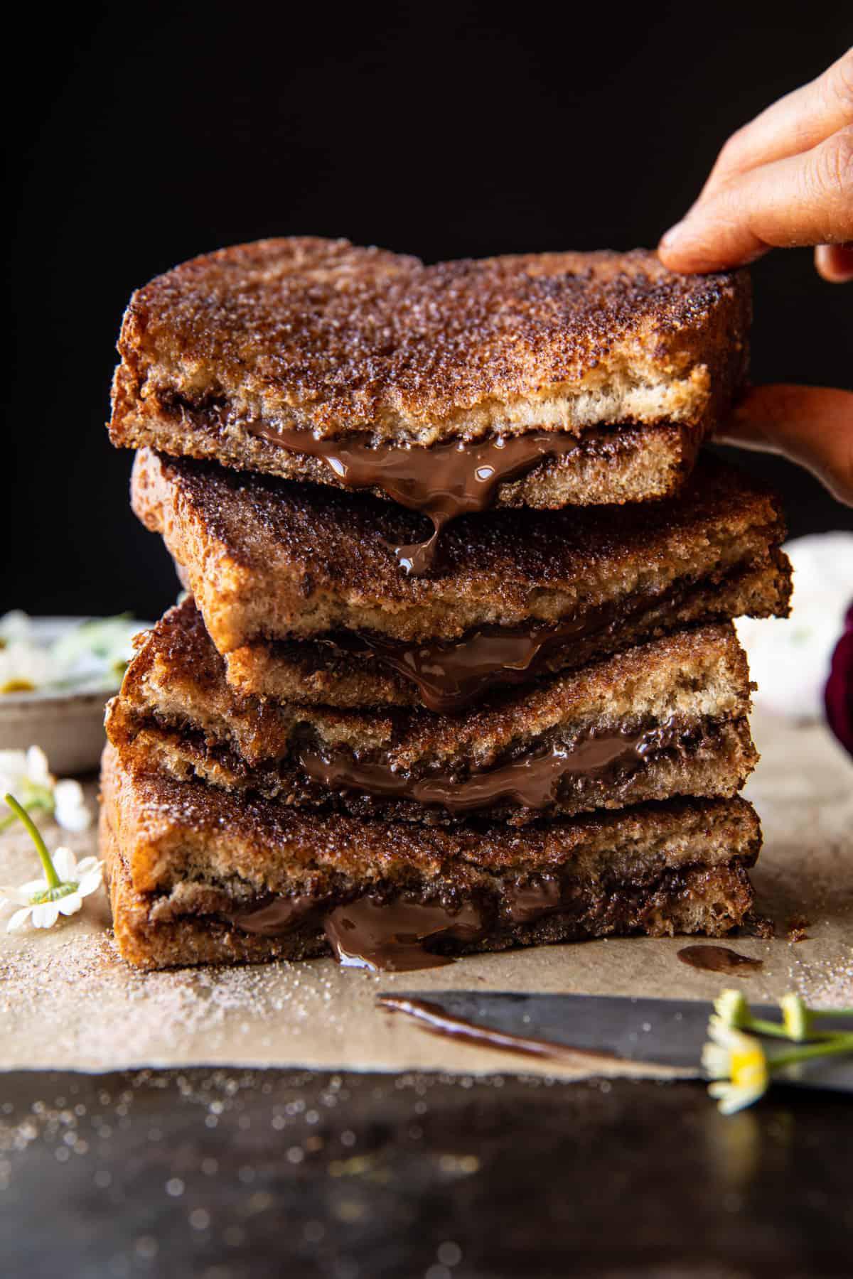If you're looking for something that will go a little bit easier on your stomach, consider this toast recipe! Not only is cinnamon sugar toast a classic that has us feeling all kinds of nostalgic, but the addition of dark chocolate gives it a grown-up spin. (via <strong><a href="https://www.halfbakedharvest.com/5-minute-grilled-cinnamon-toast-with-chocolate/">Half Baked Harvest</a></strong>)