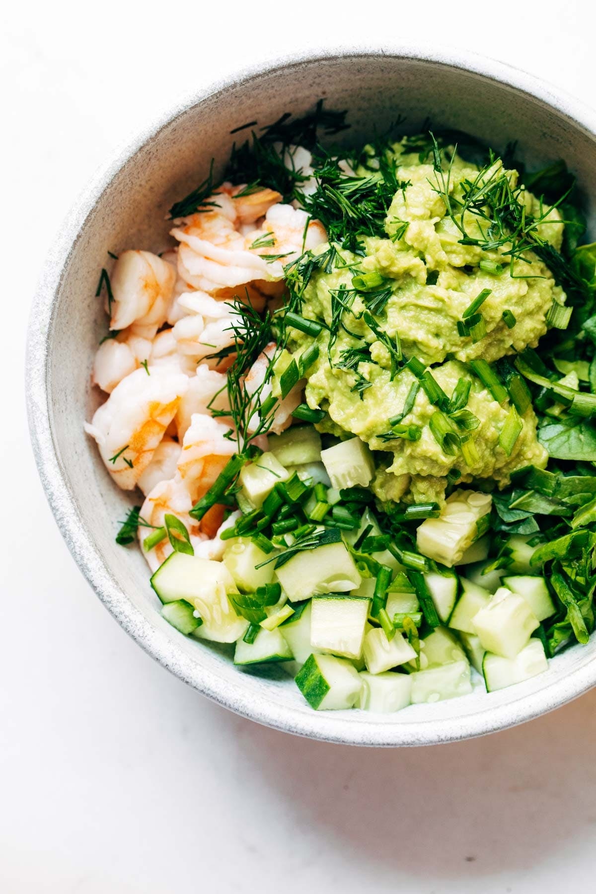 Three-minute poached shrimp, avocado, cucumber, and fresh herbs compose a salad you never knew your lunch repertoire needed. (via <strong><a href="https://pinchofyum.com/super-quick-avocado-shrimp-salad">Pinch of Yum</a></strong>)
