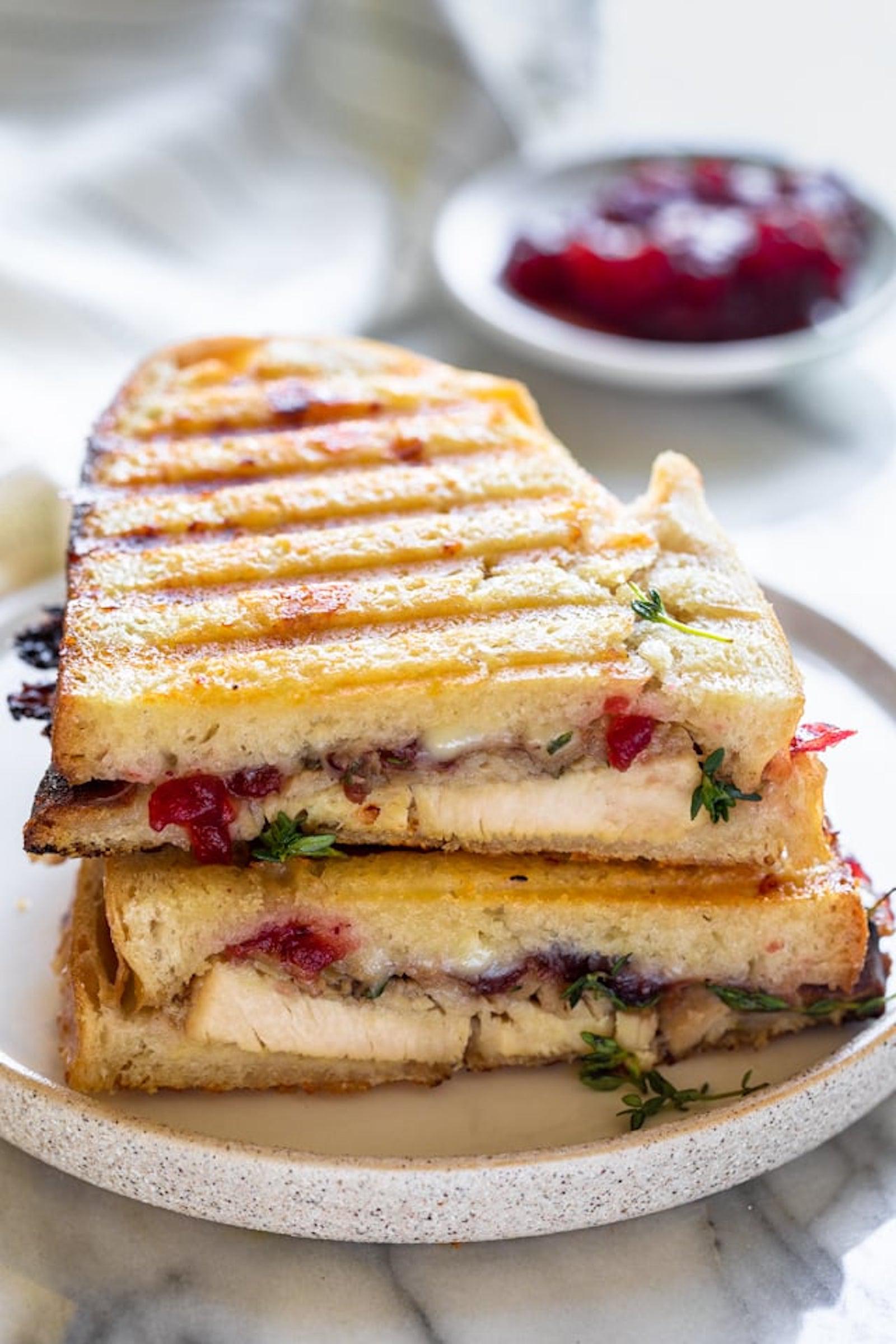 It doesn't have to be Thanksgiving to enjoy a turkey-cranberry-cheese sandwich. We'd eat this every day of the year. (via <strong><a href="https://feelgoodfoodie.net/recipe/turkey-panini/">Feel Good Foodie</a></strong>)