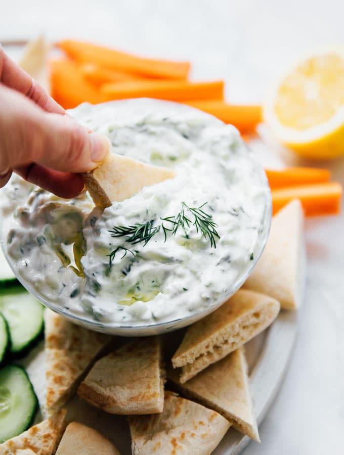 With a bag of carrot sticks or pita chips, this easy tzatziki is an instant lunch. (via <a href="https://www.liveeatlearn.com/tzatziki/"><strong>Live Eat Learn</strong></a>)