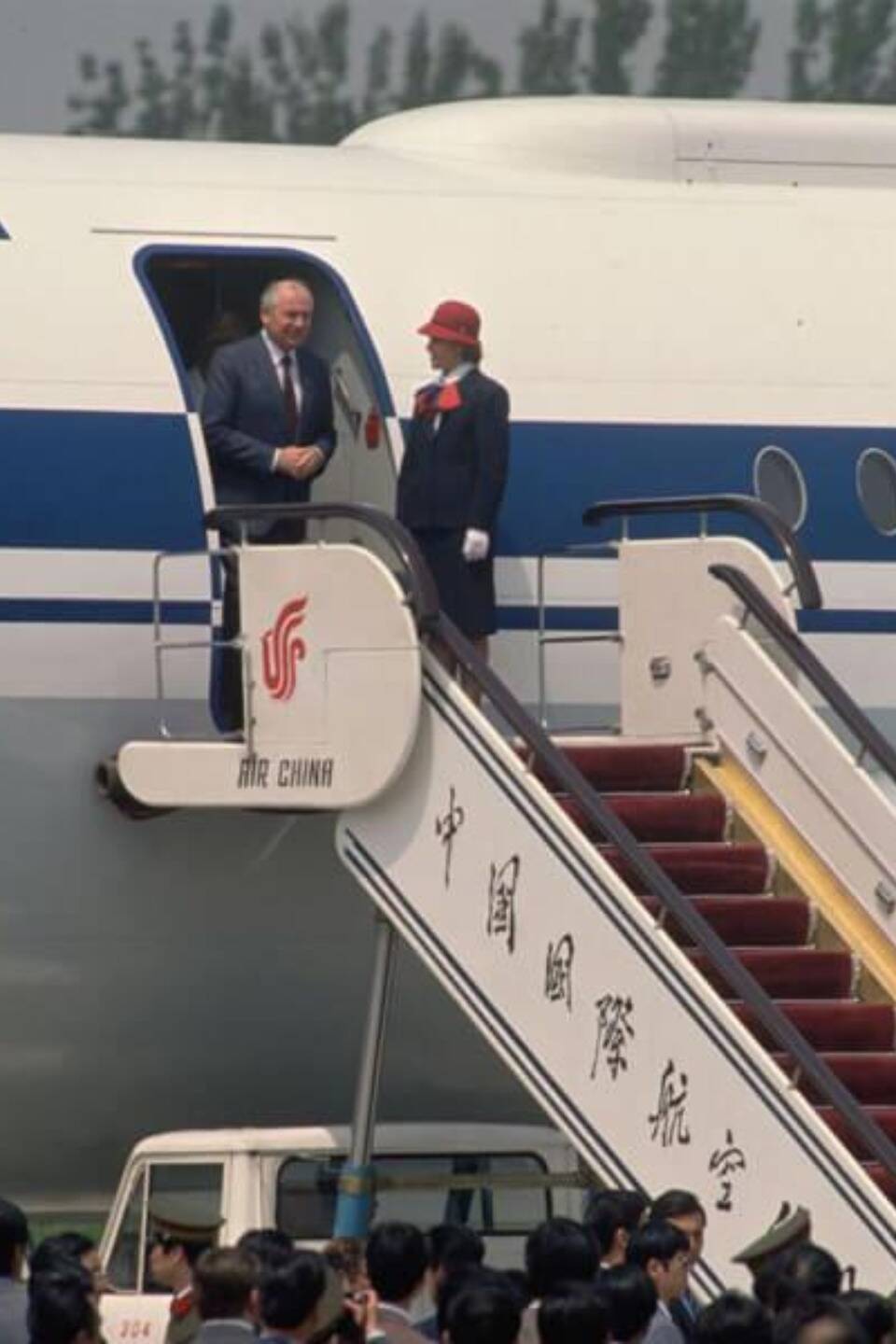<p>Every duty of a flight attendant comes with a lot of responsibility. It can also become a bigger job, if there are high-profile passengers on board. This photo taken in 1989 shows Soviet leader Mikhail Gorbachev arriving in Beijing, China.</p> <p>Escorting him off the aircraft is a flight attendant. Standing next to Gorbachev, she was a part of history as he was photographed walking off of the plane. He was the first Soviet leader to arrive in China since Khrushchev visited in 1959.</p>