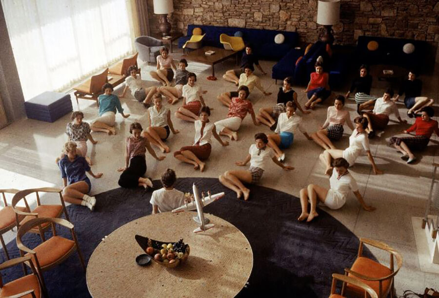 <p>It was important to the airlines that their flight attendants be fit and slim, and they did everything to encourage them to stay in good shape. Here's a photo that was featured in a 1958 issue of <i>LIFE </i>magazine showing flight attendants learning 'slimming' exercise techniques.</p> <p>The class was part of the curriculum that aspiring flight attendants would need to enroll in at the American Airlines' college for stewardesses, located outside of Dallas, Texas. The college was the first of its kind to train flight attendants.</p>