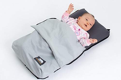 <p><strong>£29.15</strong></p><p>This isn't a traditional travel cot, but frequent flyers will love this dinky inflatable day bed for use on aeroplanes. Designed to keep your baby in a cosy natural sleeping position on your lap, it's small enough to pop into your hand luggage and comes with a zip-up cover to keep wriggly tots secure. We can't promise it will make your little one sleep for an entire long haul flight, but anything that minimises disruption (and side-eye from fellow grumpy passengers) gets our vote.</p><p><strong>Dimensions</strong>: ‎75 x 45 x 6 cm<br><strong>Weight</strong>: 500g</p>
