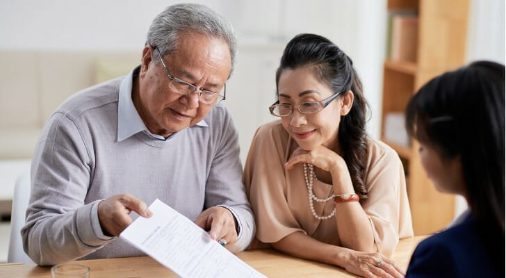 How should retirees divide a portfolio among stocks, bonds and cash?