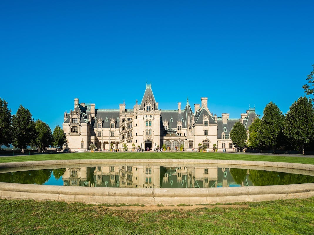 <p>The <a href="https://www.businessinsider.com/largest-home-in-united-states-biltmore-estate-photos">Biltmore House</a>, built in the late 1800s by George Vanderbilt, features 35 bedrooms, 43 bathrooms, and 65 fireplaces. The gardens covering the estate's 8,000 acres were designed by American landscape architect <a href="https://www.biltmore.com/" rel="nofollow noopener">Frederick Law Olmsted</a>.</p>