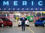 DETROIT, MI - NOVEMBER 17: U.S. President Joe Biden makes his entrance on November 17, 2021 at General Motors' Factory ZERO electric vehicle assembly plant in Detroit, Michigan. U.S. President Joe Biden delivered remarks on how the Bipartisan Infrastructure Law creates a future made in America, builds electric vehicle charging stations across the country to make it easier to drive an electric vehicle, reduces emissions to fight the climate crisis, and creates good-paying, union jobs across the country. (Photo by Nic Antaya/Getty Images)